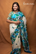 Neelbonolata Ivory Hand Painted Bishnupuri Silk Saree | Sarmistha Creations